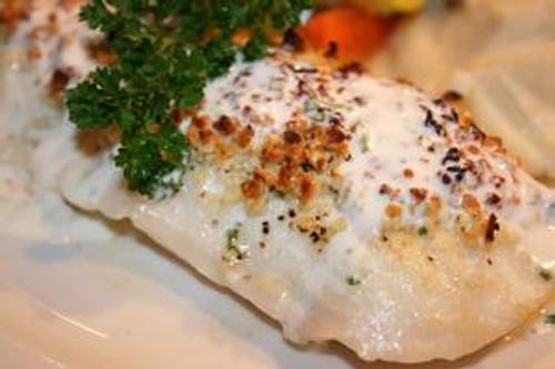 Image about Domenico's on the Wharf Features Wild Alaskan Halibut During the Month of April