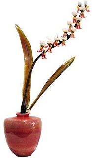 Orchid with white Mini Blossoms by Eric Edner