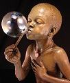 Summer Days - Little Carefree Child Blowing Bubbles