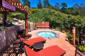 Image about Our Terrace Park features an outdoor hot tub and pergola for your enjoyment and relaxation.