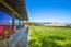 Large and lush lawn with expansive valley views (Image 2)