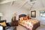 Bright and airy bedroom with high vaulted ceiling (Image 13)