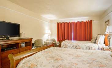 Image about Guest room with flat-screen television