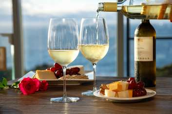 Image about Each evening enjoy our complimentary wine and cheese reception and take in the breathtaking views from the Cliffside Deck.