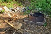 Most Ripplewood cabins feature lounge chairs and a private fire ring for relaxed evenings outdoors. (Thumbnail)