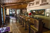 Cozy saloon-style breakfast bar offering hot coffee, espresso, and our full fresh-made menu. (Thumbnail)