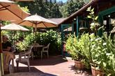 Relax on the caf&eacute;'s sunny patio and enjoy fresh, homemade breakfast and lunch. (Thumbnail)