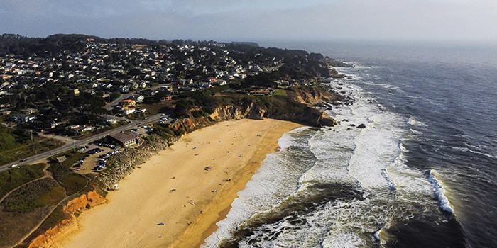 Aerial photo of Half Moon Bay coast by Griffin Wooldridge free to use from Pexels.com