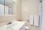 White tiled bathroom (Image 21)