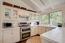 Kitchen with modern stainless steel appliances (Image 9)