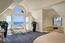 Master bedroom features ocean vistas and a private balcony (Image 14)